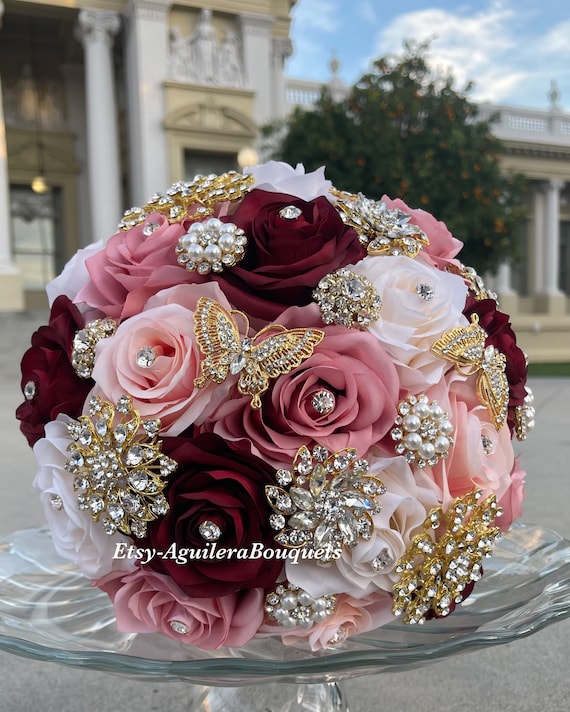 Red Roses and Diamond Pins  Bridal bouquet, Floral event design, Beautiful  bouquet