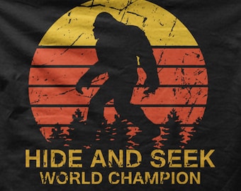 Sasquatch Bigfoot Hide and Seek world champion black with red t-shirt 9032