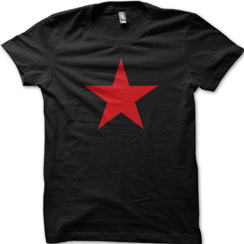May include: A black t-shirt with a large red five-pointed star in the center.