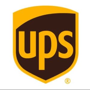 May include: The UPS logo is a brown shield with a curved top and a yellow border. The letters "UPS" are in yellow and are centered on the shield.