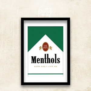 May include: A green and white graphic print of a cigarette pack with the text "Menthols" and "Name don't like 'em". The pack has a red and white logo with the text "The 1975".