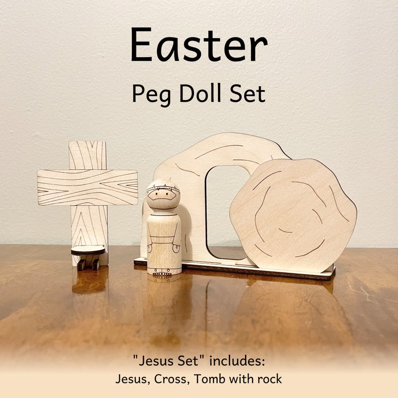 Easter peg doll set that includes Jesus, a cross on which the Jesus peg doll can stand, and a Tomb with rock.
