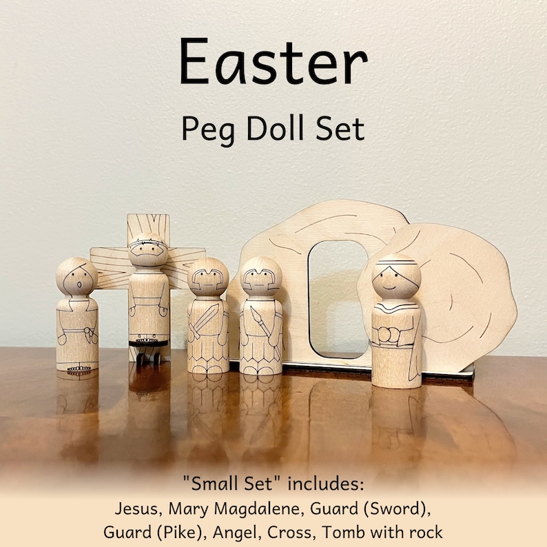 Easter peg doll set that includes five peg dolls that look like Jesus, Mary Magdalene, Guard with sword, Guard with pike, and Angel. Also included are a cross with stand for Jesus to be on and a Tomb with rock.