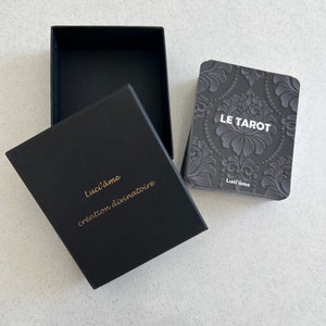 tarot (rupture de boîte, baisse du prix)