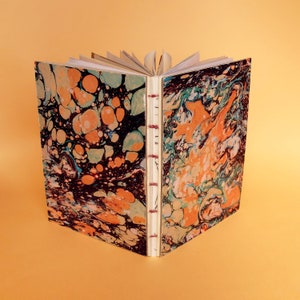 Marbled Notebook with Glued, Open Spine