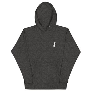 May include: A dark gray hooded sweatshirt with a white embroidered design of a hand with a raised fist on the left chest.