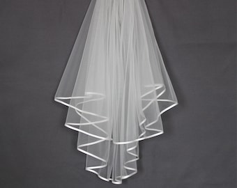 Double tiered bridal veil with satin edge, on comb