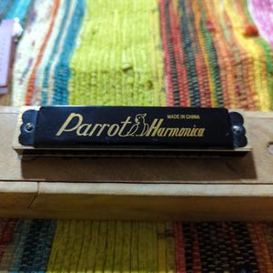 Parrot Harmonica, musical instruments, vintage and retro harmonica, Black Parrot Harmonica