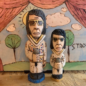 Hand-carved from wood, The King of Rock and Roll himself, Elvis Presley. R.I.P.