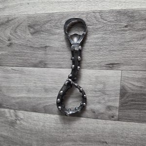 Hand forged tentacle bottle opener