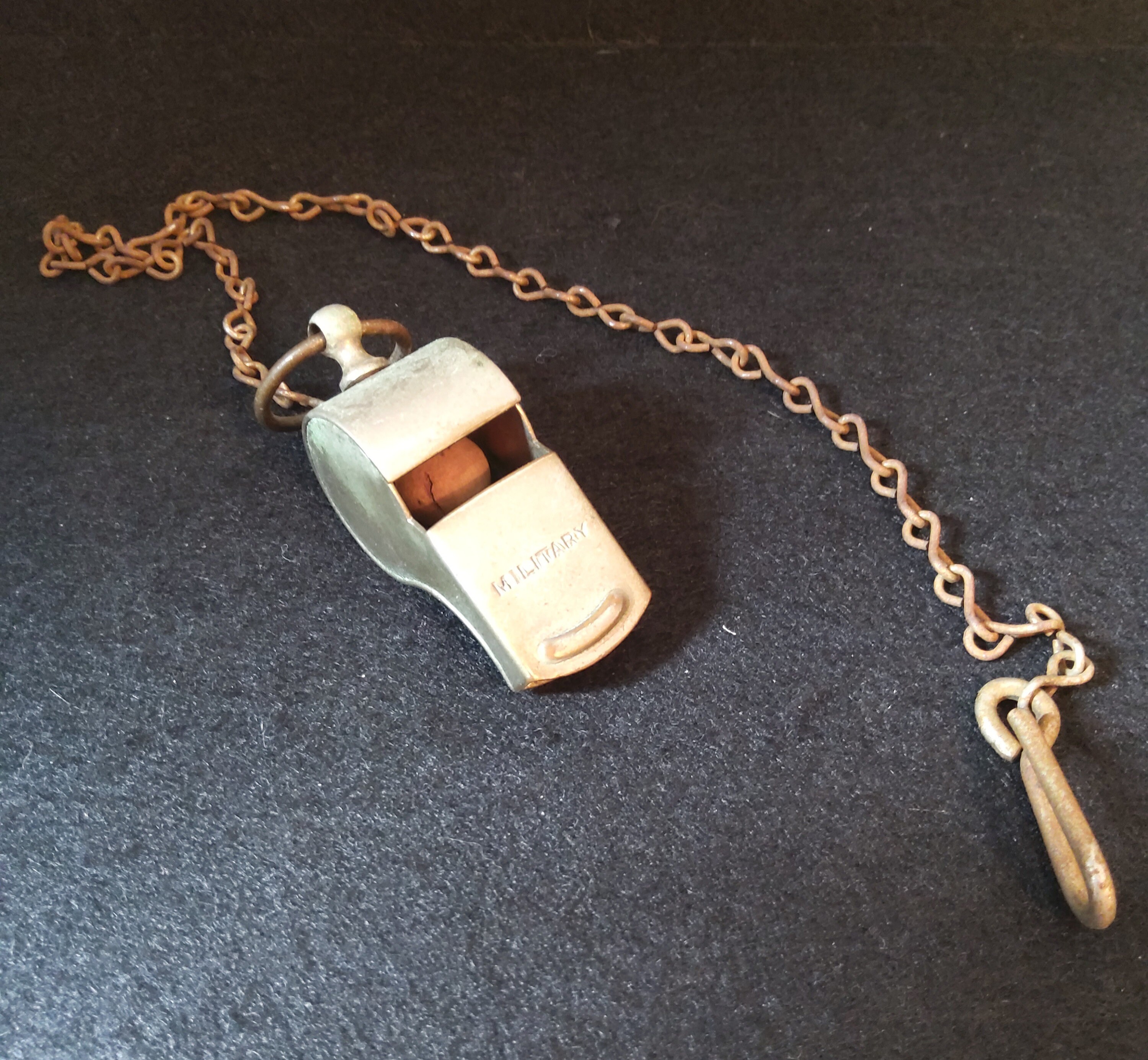 World War II US Army whistle with chain no cracks or chips