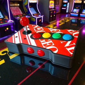 Estuche retro para joystick arcade de 6 botones con temática NEOGEO