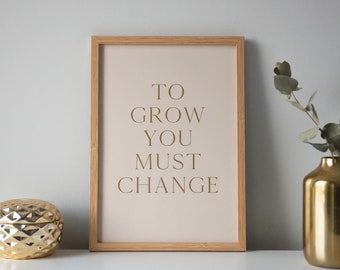 To Grow You Must Change framed artwork. Make a statement with this inspirational typography.