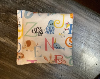 Booboo pillows Children’s heating / cooling pad  pillows. Made with organic rice, flax with or without lavender.