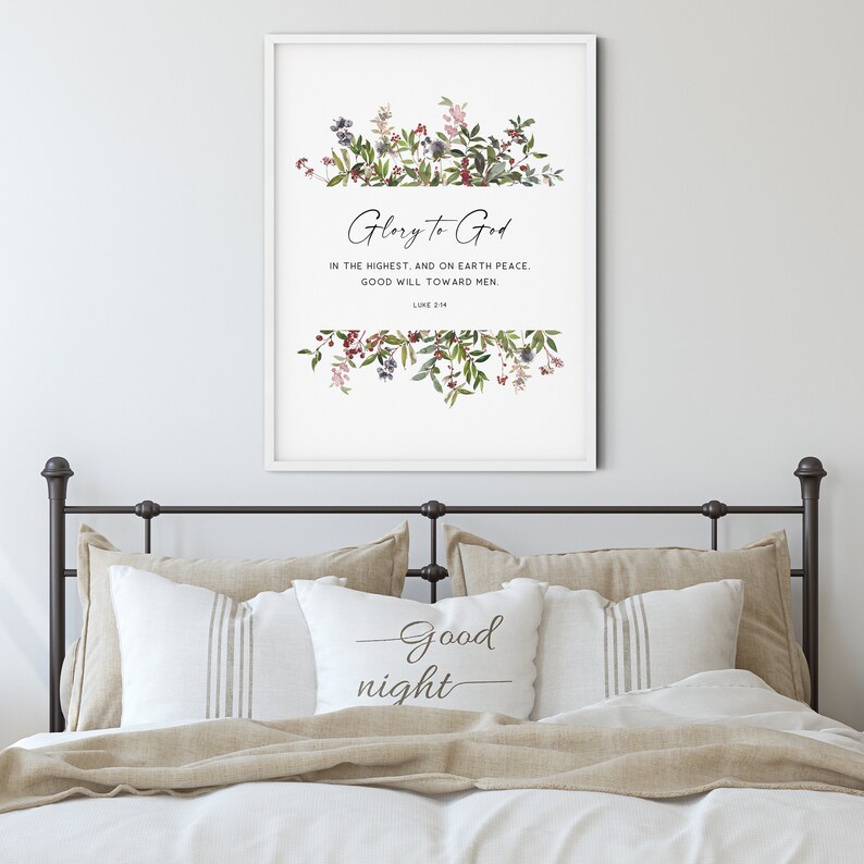 May include: A framed print with a white background and a floral design. The print features the text "Glory to God in the highest, and on earth peace. Good will toward men. Luke 2:14".
