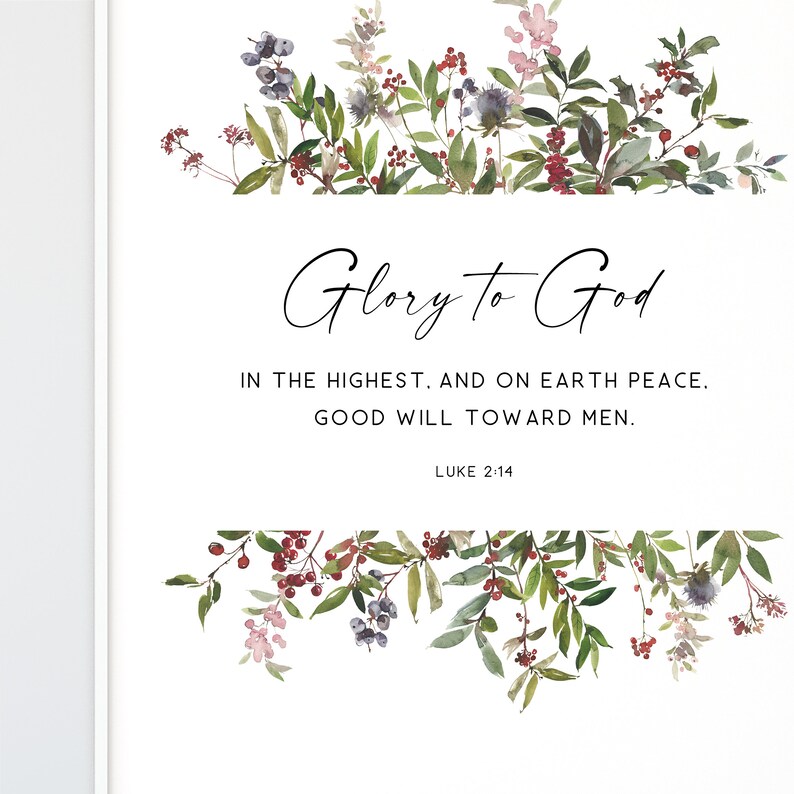 May include: A watercolor illustration of a floral wreath with berries and leaves. The text "Glory to God" is in the center of the wreath, followed by the scripture "In the highest. And on earth peace. Good will toward men." and "Luke 2:14".