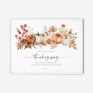 May include: A framed print featuring a watercolor illustration of pumpkins and fall foliage. The word "thanksgiving" is written in elegant script, with additional text below. The artwork is set against a white background.