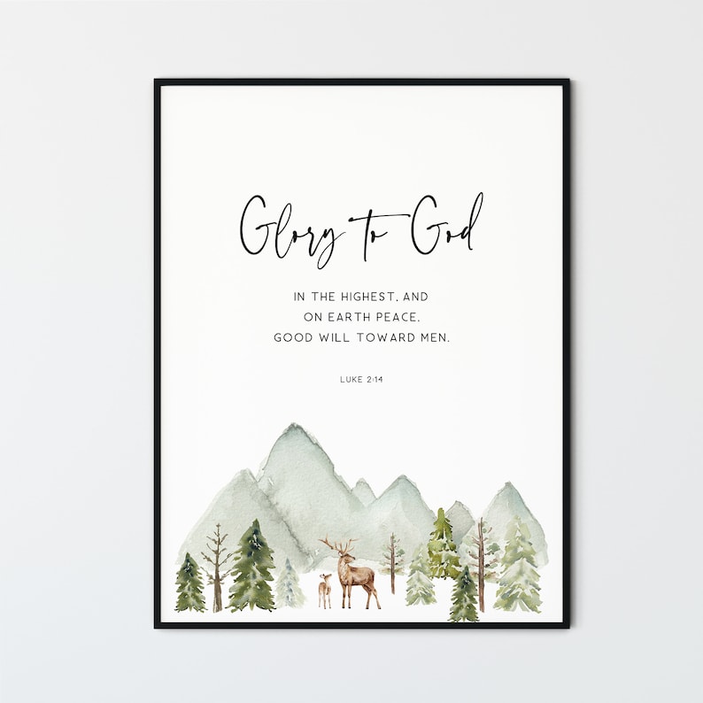 May include: A watercolor print with a mountain landscape, two deer, and the text "Glory to God" in cursive. The text below reads "In the highest, and on earth peace. Good will toward men. Luke 2:14".