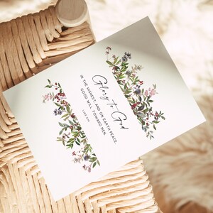 May include: A white card with a floral design and the text "Glory to God" in the highest, and on earth peace. Good will toward men. Luke 2:14.