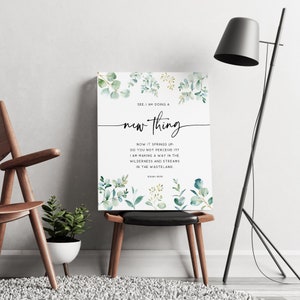 May include: A watercolor print with a white background and green foliage. The print features the text "See, I am doing a new thing. Now it springs up, do you not perceive it? I am making a way in the wilderness and streams in the wasteland. Isaiah 43:19"