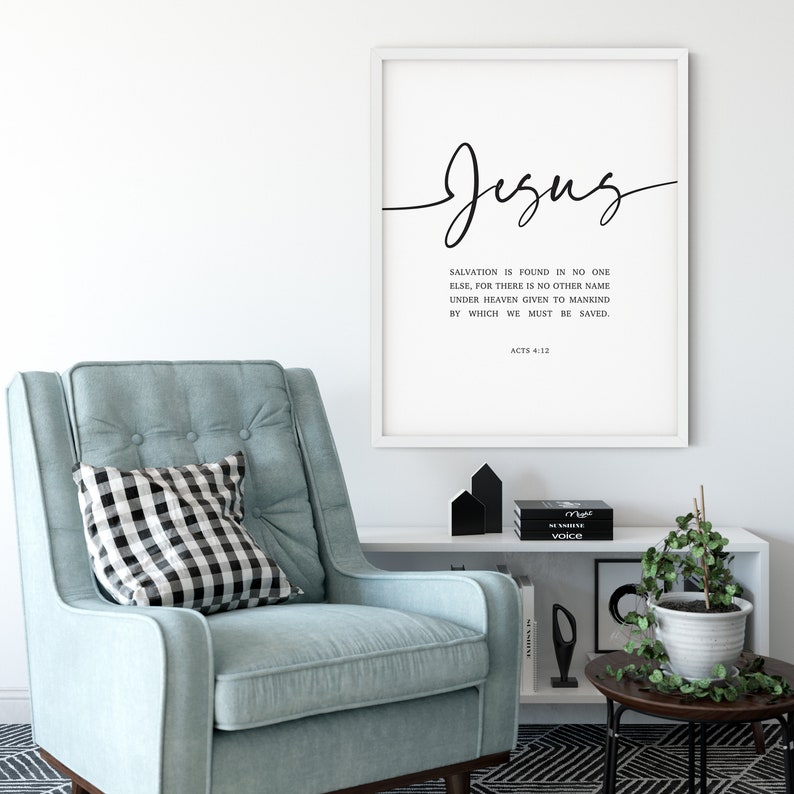 May include: A black and white printable wall art print with a white background and black text. The text reads "Jesus" in a cursive font and includes a Bible verse from Acts 4:12. "Salvation is found in no one else, for there is no other name under heaven given to mankind by which we must be saved. Acts 4:12"