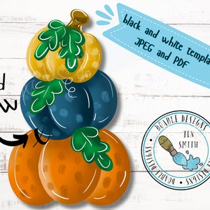 Puede incluir: Una pila de tres calabazas en naranja, azul y amarillo con hojas verdes. Las calabazas están pintadas con un aspecto rústico y desgastado. La imagen incluye el texto "add bow" y un logotipo para "Doable Designs".