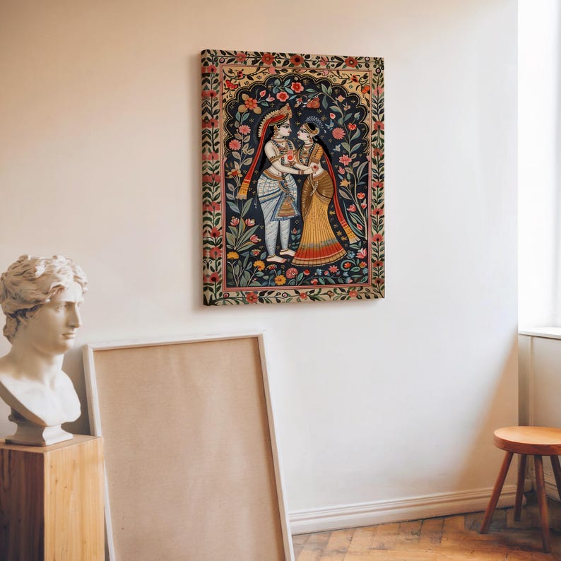 Radha Krishna wall art displayed in a modern neutral interior with rich teal red and orange floral details
