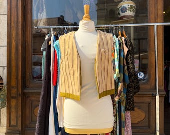 Ärmellose, wendbare Jacke