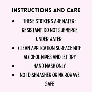 May include: Instructions and care information for stickers, with black text on a light pink background. The text includes: water-resistant, do not submerge, clean with alcohol wipes, hand wash only, and not dishwasher or microwave safe.