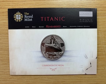 Titanic Remembered Commemorative Medal from the Royal Mint in a display Card and a Titanic Novelty Banknote