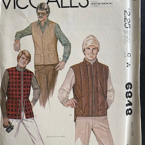 May include: A sewing pattern for two vests. The pattern is for men's size small. The pattern is from McCall's and is number 6948. The vests are both brown and have a zipper closure. One vest has a quilted design and the other has a more traditional look. The pattern includes instructions for making the vests.