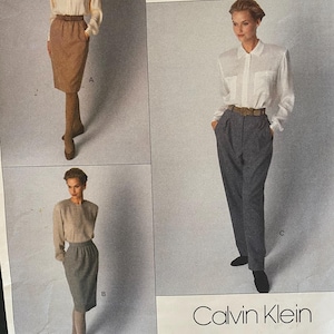 May include: Vogue Patterns American Designer sewing pattern for a Calvin Klein design. The pattern is for a skirt and blouse. The pattern number is 2392. The sewing rating is Easy/Facile.