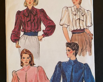 Vogue 8464 Size (8) The sleeves are the star of the show in this pattern . This is carefully cut and complete.