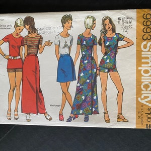 May include: Simplicity pattern 9993 for knit fabrics. The pattern includes four different styles of dresses, all with a simple, modern design. The dresses are shown in a variety of colors, including red, blue, and white.