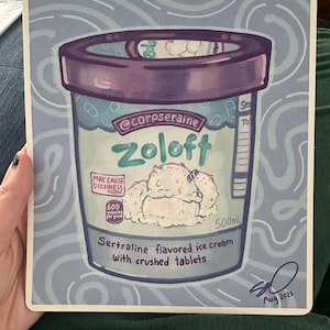 May include: A whimsical illustration of a pint of "Zoloft" ice cream, with a purple lid and a light blue container. The label reads "Sertraline flavored ice cream with crushed tablets." It also states "May cause dizziness" and "600 calories per pint."
