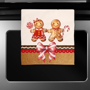May include: A festive kitchen towel featuring two gingerbread people holding a lollipop and candy cane. The towel has a red and white bow, and a brown and white border. The design is perfect for the holiday season.