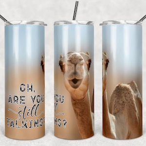 May include: A stainless steel tumbler with a camel printed on it. The text "Oh, are you still talking?" is printed on the tumbler.
