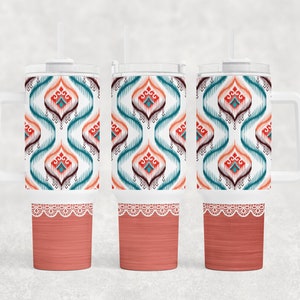 May include: Three white tumblers with a teal, red, and orange geometric pattern. Each tumbler has a coral pink bottom with a white lace trim.