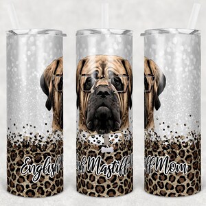May include: Three stainless steel tumblers with a silver glitter background and a leopard print design. The center tumbler features a cartoon English Mastiff wearing glasses and a collar with paw prints. The text "English Mastiff Mom" is on the tumblers.