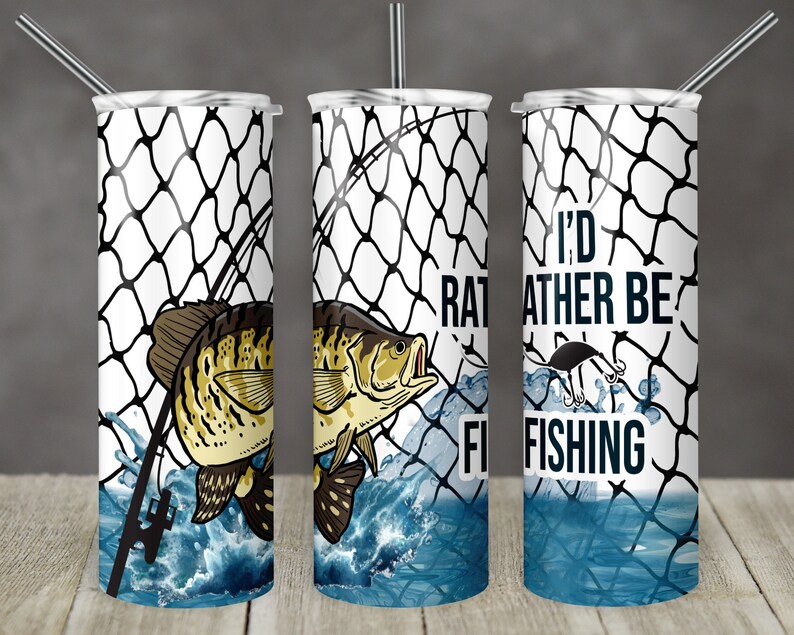 May include: A white tumbler with a fishing net design, a fish jumping out of the water, and the text "I'd Rather Be Fishing".