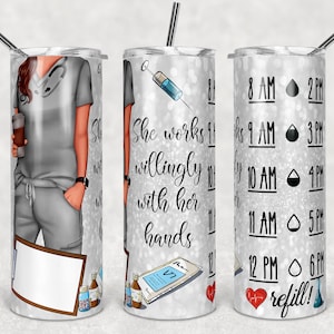 May include: A silver glitter tumbler with a design of a female nurse with a stethoscope and a coffee cup. The text "She works 11 hours willingly with her hands" is on the tumbler. The other side of the tumbler has a schedule of times and a heart with a heartbeat line.