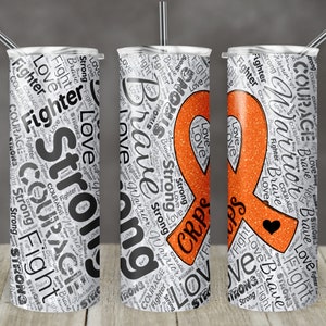 May include: Three stainless steel tumblers with lids and straws. The tumblers feature a design with the words "Strong", "Brave", "Love", and "Fight" in a repeating pattern. One tumbler has an orange ribbon with the text "CRPS".