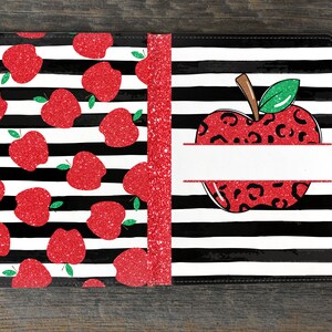 May include: A black and white striped notebook cover with a red glitter apple design. The apple has a leopard print pattern and a blank space for personalization.