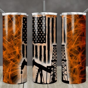May include: Three stainless steel tumblers with a black and orange design. The design features an American flag with an oil rig and a pump jack in front of it. The background is a swirling orange and black pattern.
