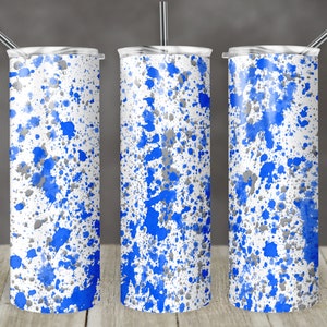 May include: Three stainless steel tumblers with a white background and blue and gray paint splatters.