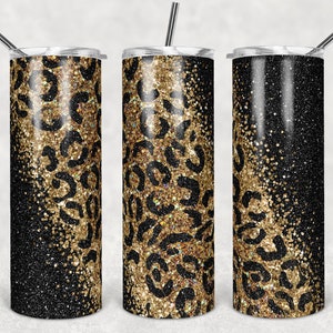 Pode incluir: Três copos de aço inoxidável com designs de glitter preto e dourado. Os copos têm um padrão de leopardo com detalhes de glitter dourado.