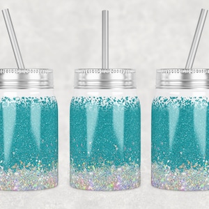 May include: Three teal and silver glitter mason jar tumblers with silver straws. The tumblers have a gradient of teal glitter fading to silver glitter.