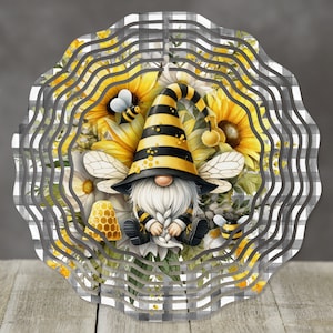 May include: A yellow and black bee gnome with a white beard and wings, surrounded by sunflowers and honeycombs. The gnome is wearing a black and yellow striped hat. The background is a gray and white checkered pattern.
