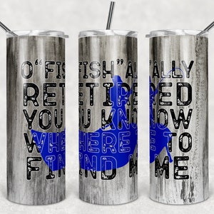 May include: A stainless steel tumbler with a wood grain design and the text "I'm officially retired, you know where to find me". The text is in black with a distressed look. A blue fish silhouette is behind the text.