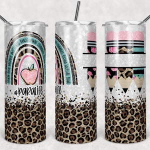 May include: A set of three stainless steel tumblers with a white background and a leopard print design. The tumblers feature a rainbow with the words "teach love inspire motivate encourage connect", an apple with the words "#paralife", and a pencil with flowers and the words "connect fiction include read".
